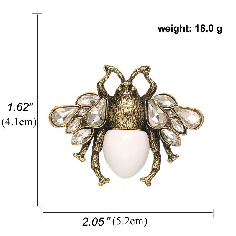 Golden/White Embellished Insect Brooch